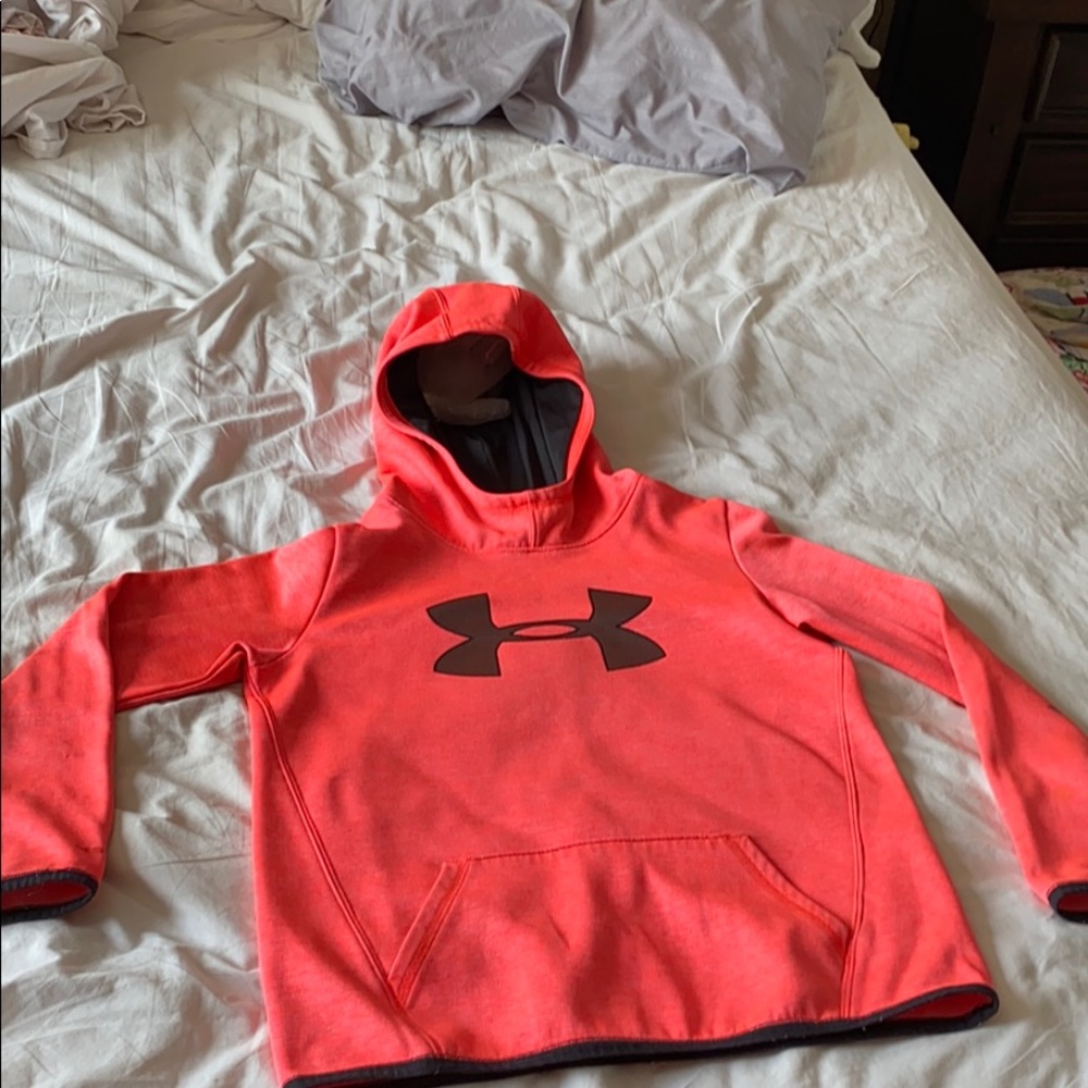 I am selling a pink and orange under armor hoodie
